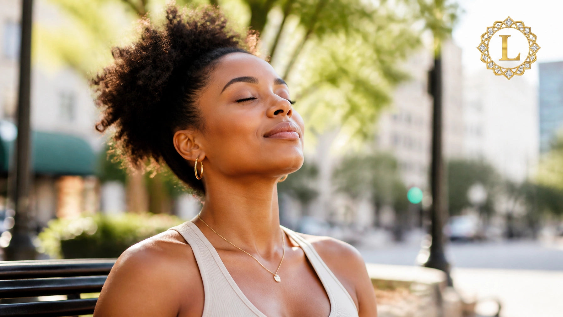 A serene African American woman practicing mindfulness in a sunlit urban setting